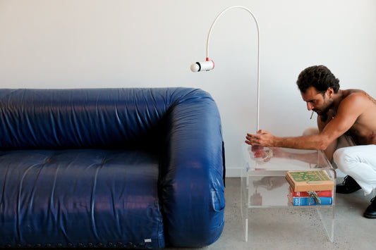 anfibio sofa with light and modern side table