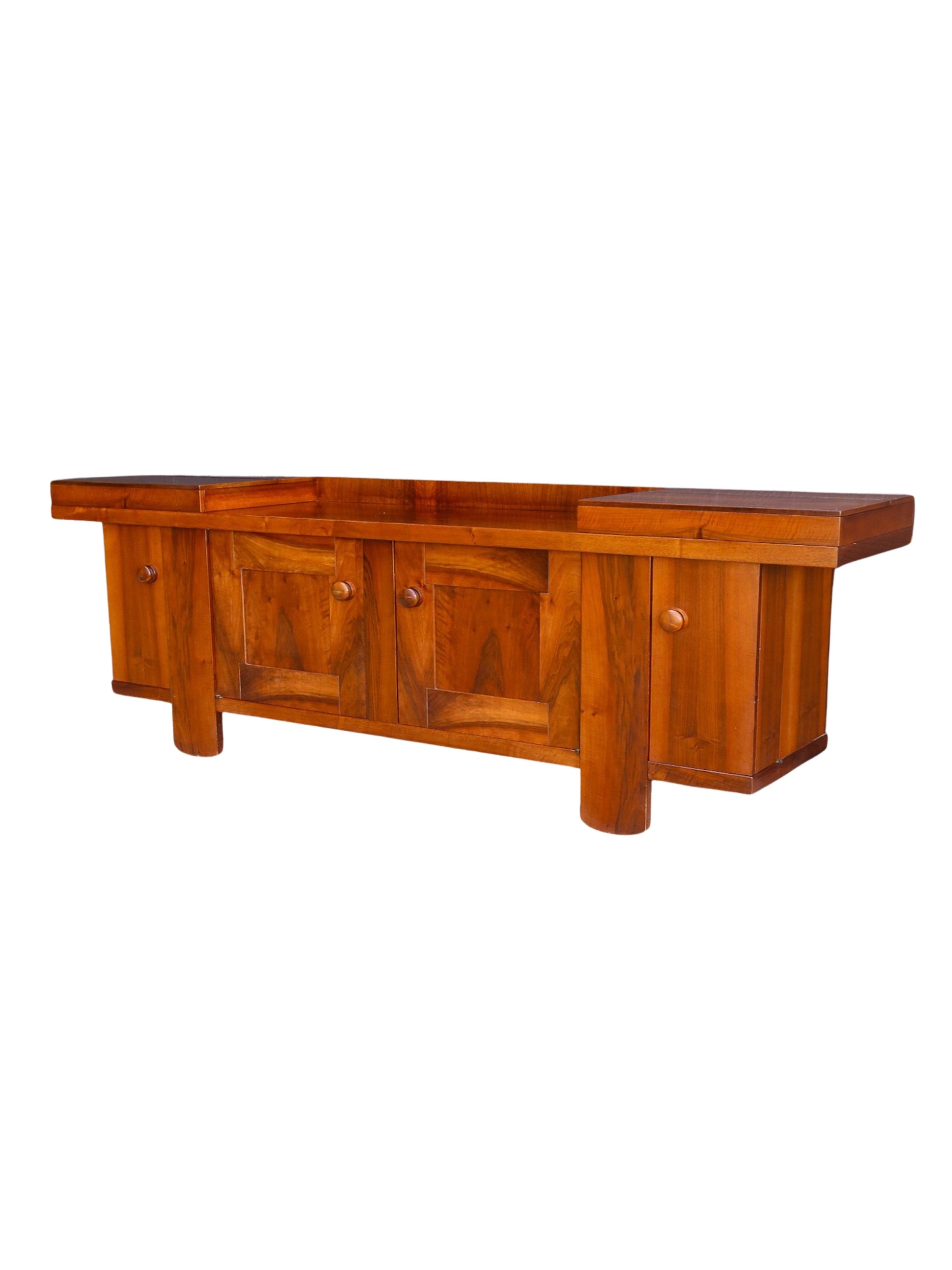 A vintage walnut wood sideboard by Silvio Coppola with multiple storage compartments and a visible brand label on the top right corner, featuring a rectangular shape with an open design and no visible handles.