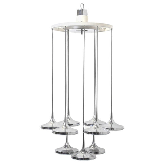 A Chrome Italian chandelier with a circular formation of chrome trumpets, each topped with a white ceramic center, designed by Angelo Brotto for Esperia, 1970s.