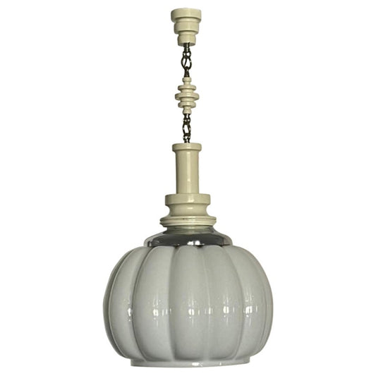 A white Murano glass pendant lamp with chrome details and woodwork attachments, featuring a ribbed design and a chain for hanging.