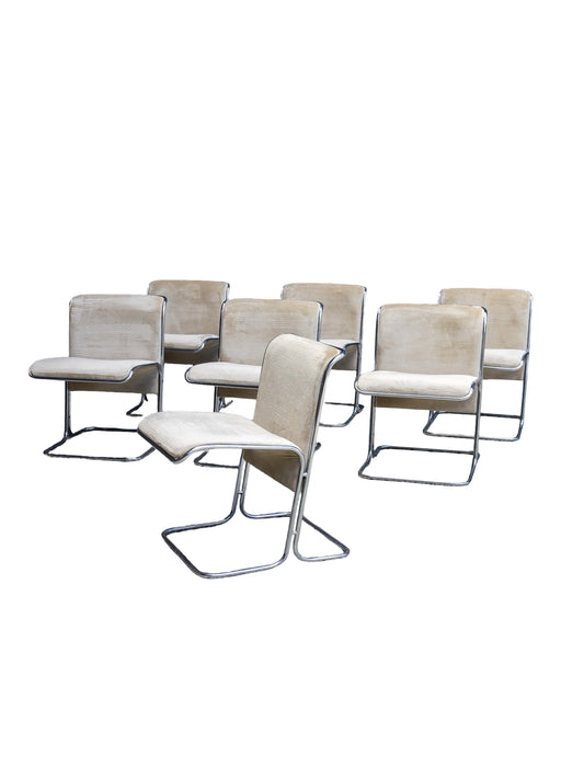 Set of seven 1970s “Calla” dining chairs by Antonio Ari Colombo for Arflex, Italy. Chrome frames with velvet upholstery in timeless Mid Century Modern style.