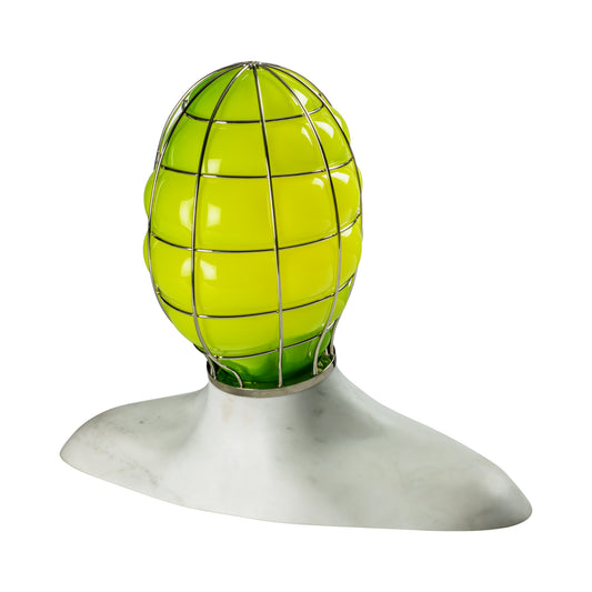 A sculpture table lamp with a green glass globe and a metallic cage, mounted on a Carrara marble base by  Fabio Novembre for Venini