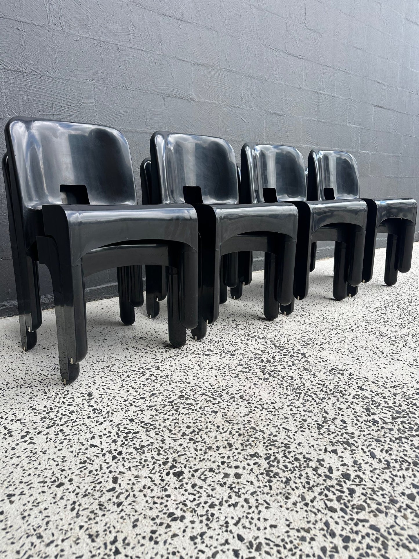 Joe Colombo for Kartell Universale Black Plastic Dining Chairs Set of Eight - Lumini Collections