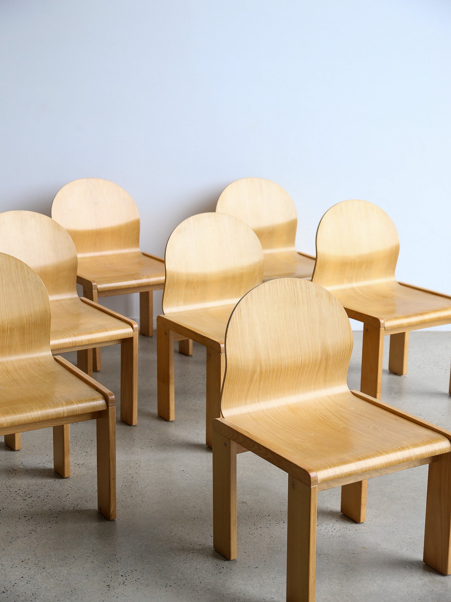 Set of eight dining chairs by Afra & Tobia Scarpa, Italy 1970s, Mid Century Modern plywood design.