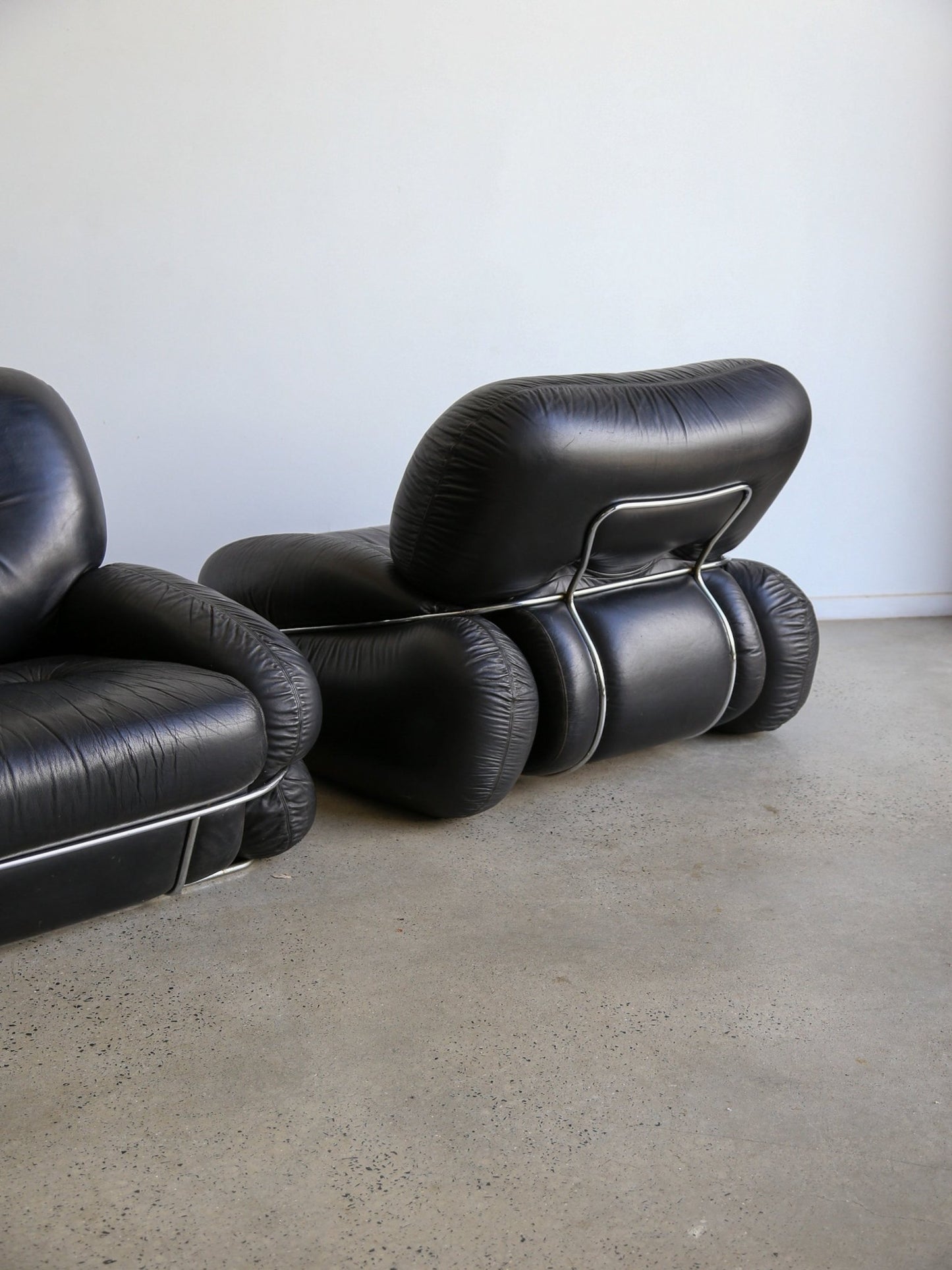 Italian Space Age “Okay” Armchairs by Adriano Piazzesi in Black Leather - Lumini Collections