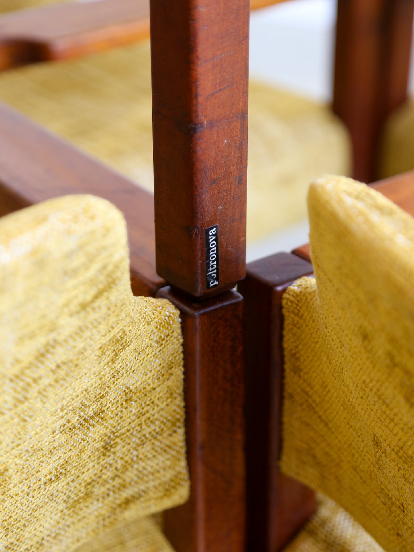 Detail of Poltronova label on Umberto Brandigi armchairs, Italian mid-century modern design