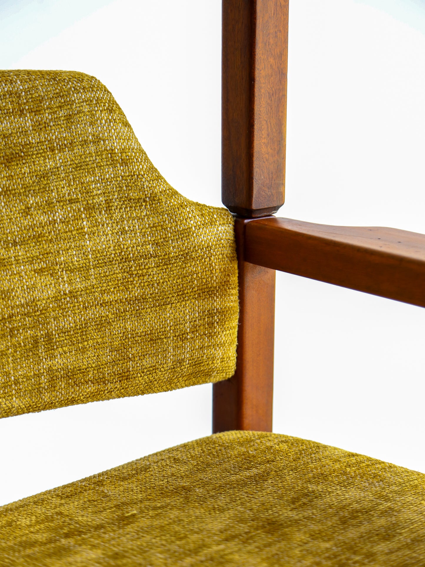 Close-up of mustard fabric upholstery and beech frame on Poltronova armchair, 1960s