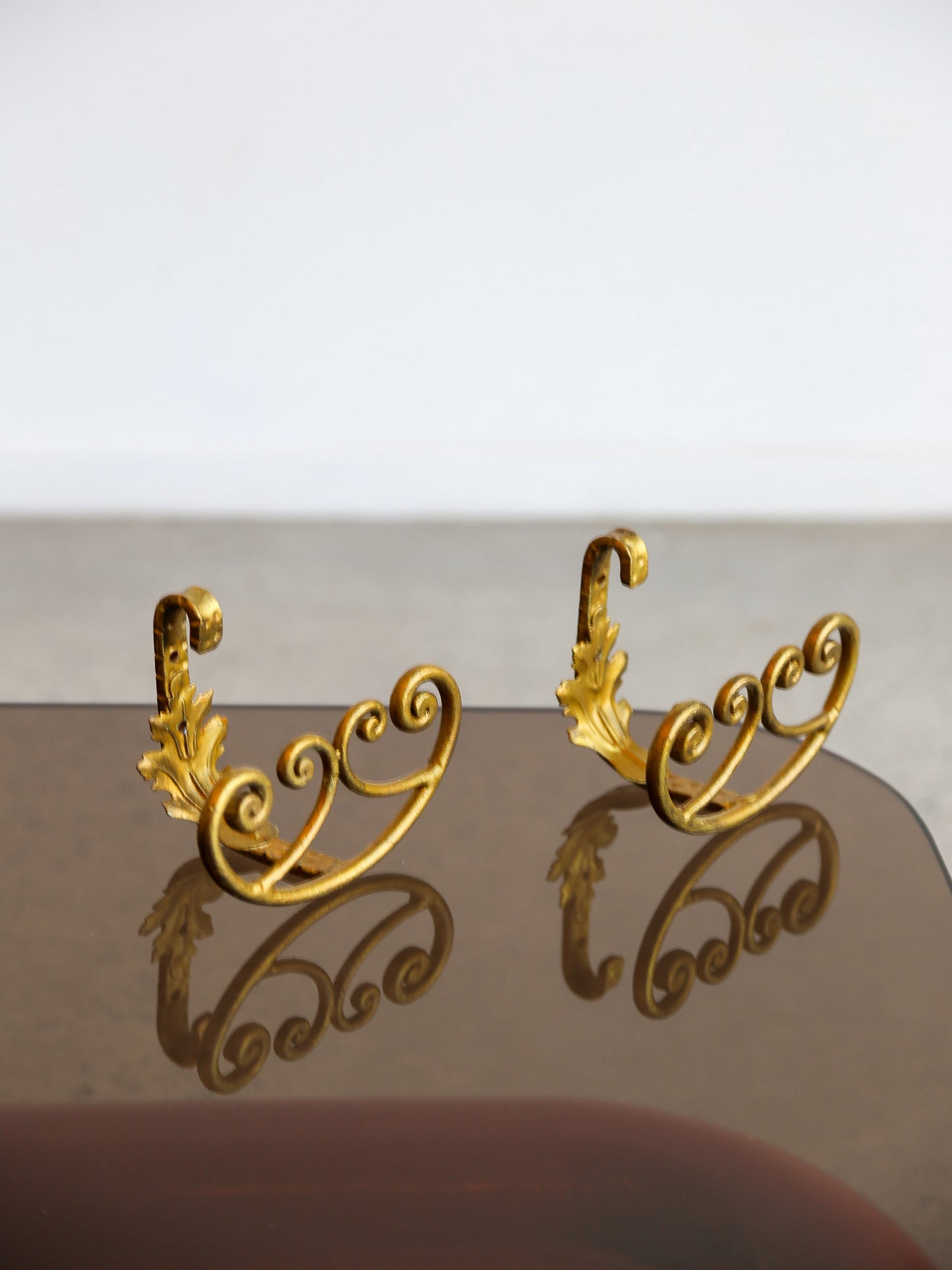 Pair of Gilded Wrought Iron Wall Hooks