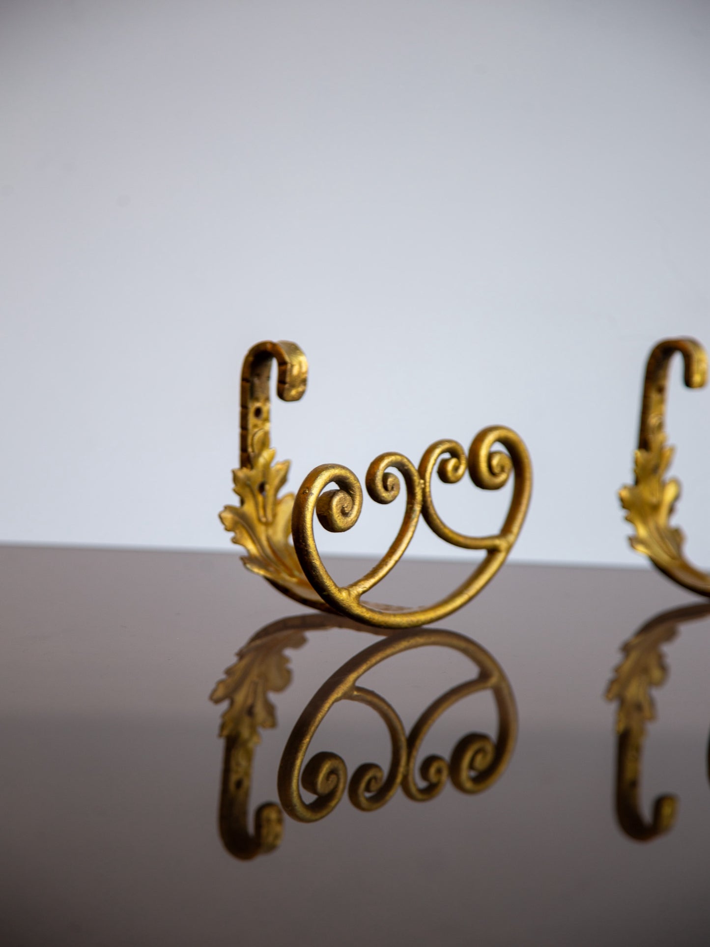 Pair of Gilded Wrought Iron Wall Hooks