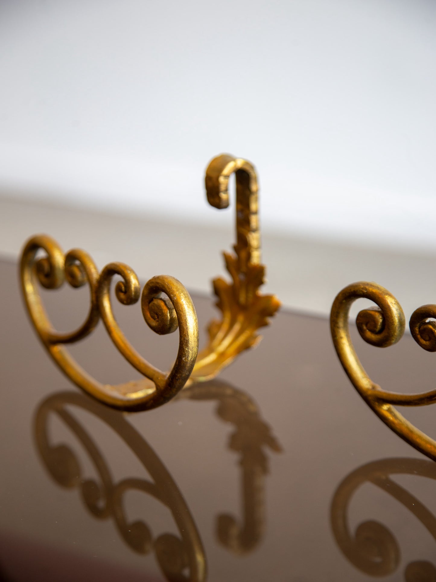 Pair of Gilded Wrought Iron Wall Hooks