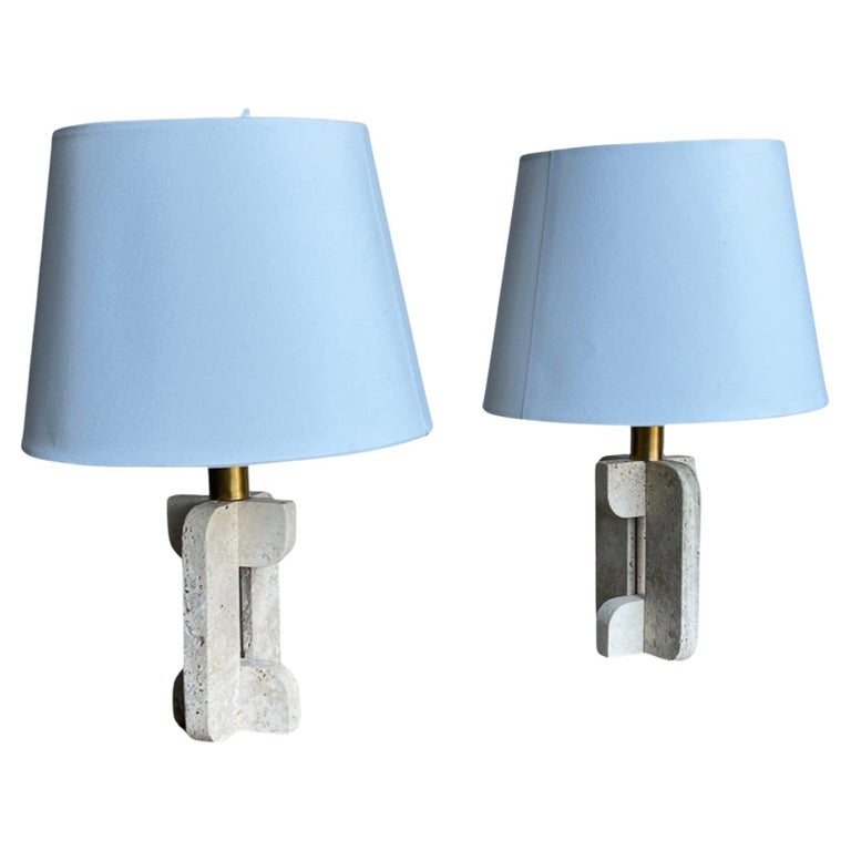 Pair of Italian table lamps with travertine base and brass details, featuring round blue lampshades by Fratelli Mannelli