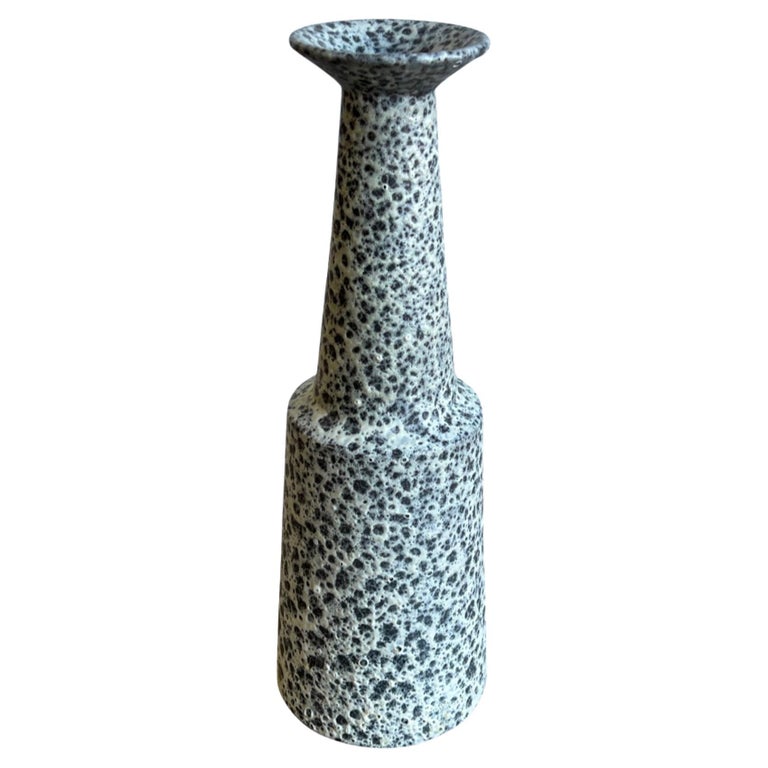 An Italian Bitossi ceramic vase with white lava work, featuring a conical shape and a textured surface.