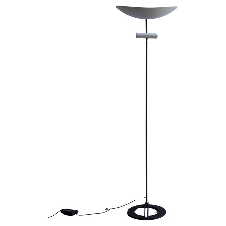 "Zen" Floor Lamp by Ernesto Gismondi, halogen floor lamp with a round shaped aluminium shade and a small lamp under the shade, standing on a heavy black base, with a foot dimmer switch.