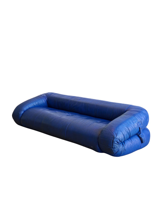 A blue leather Anfibio sofa bed designed by Alessandro Becchi for Giovannetti Collezioni with a luxuriously soft sheepskin mattress.
