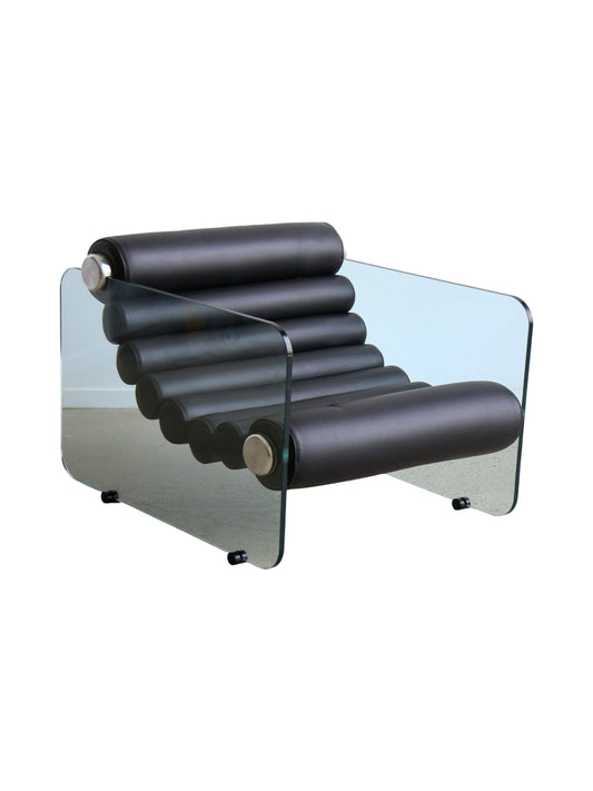 A black leather armchair with a unique design, featuring glass panels and a floating leather roll seat, indicative of Italian space age design “Fabio Lenci Hyaline chair in black leather and glass, Standing Italy 1970s”