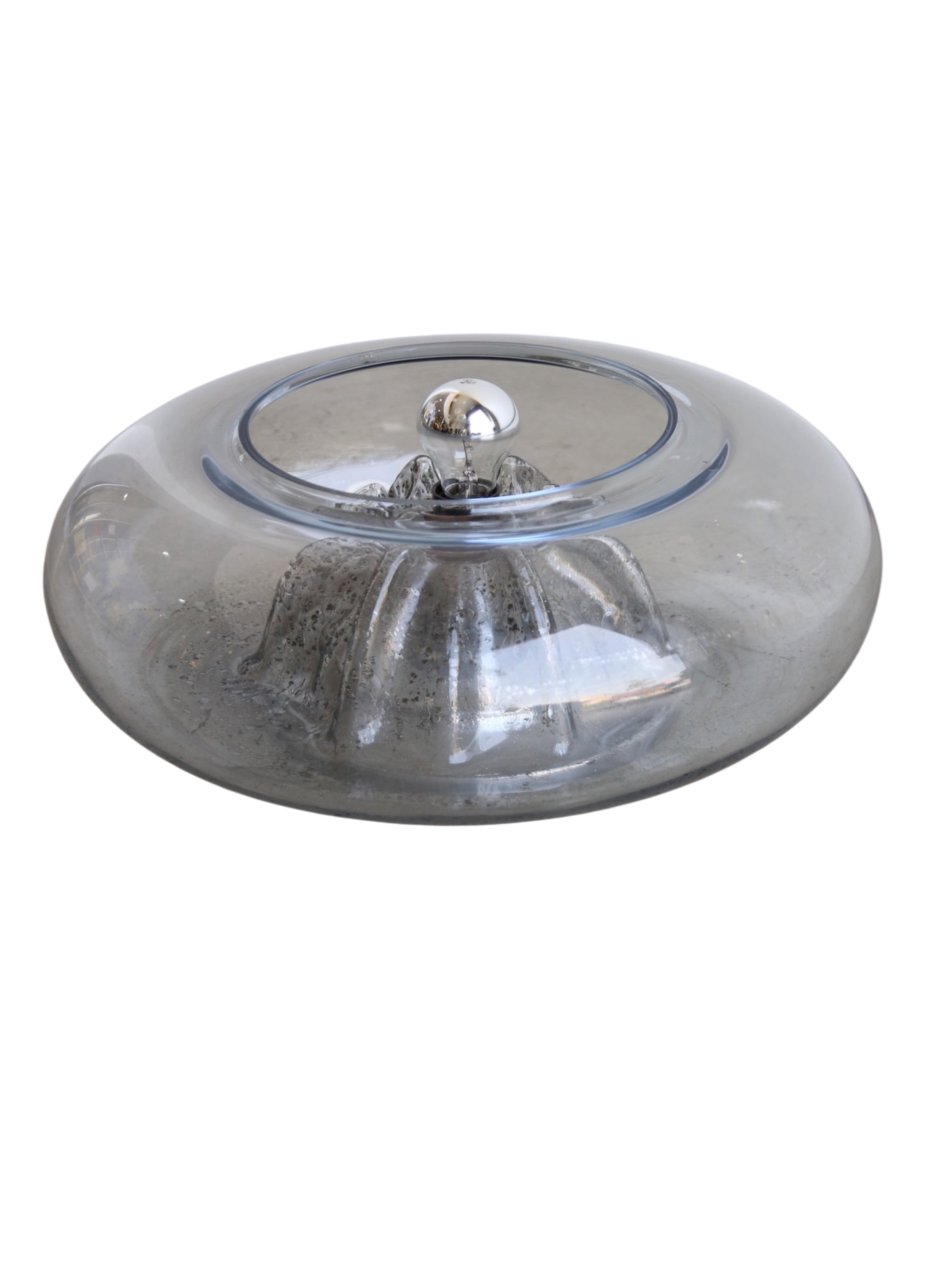 A Tony Zuccheri Vulcano Chrome & Murano Glass Table Lamp with a round chrome base and a Murano glass lampshade.