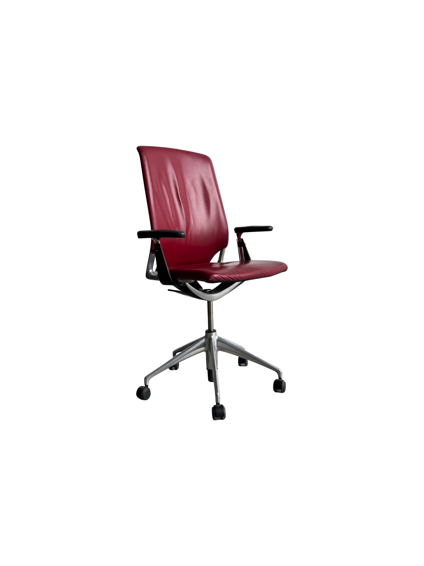 A red leather office chair with a polished aluminium base and adjustable features, designed by Alberto Meda for Vitra.