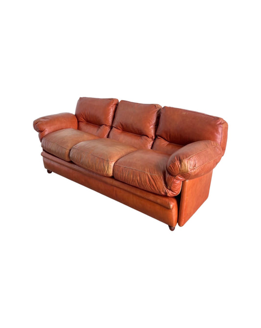 Italian mid century Poppy sofa by Tito Agnoli for Poltrona Frau, 1960s, three-seater in cognac leather with deep seat and plush cushions.