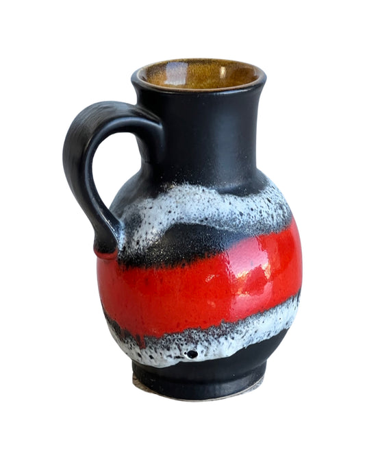 A West German red and black glazed ceramic vase with a geometric pattern from the 1960s.
