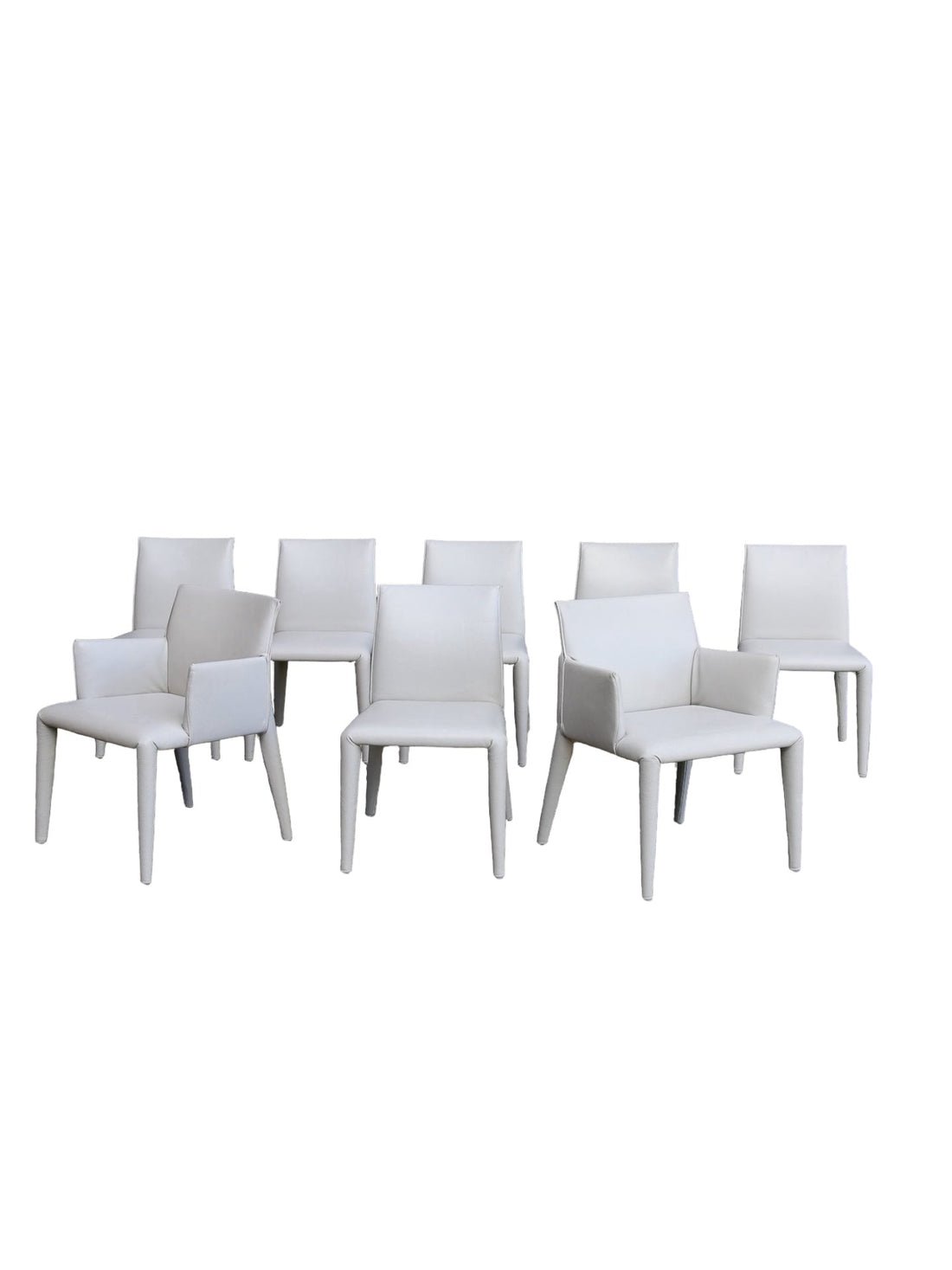 set of eight dining chairs on a white background