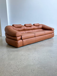 brown leather three seater sofa