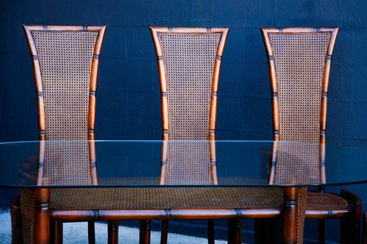 set of 3 chairs and a dining table