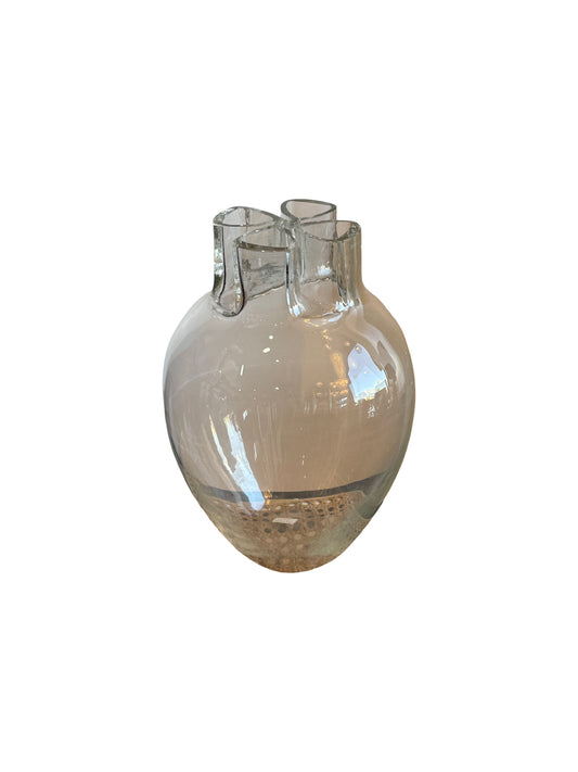 Clear glass vase with a unique design on a white background