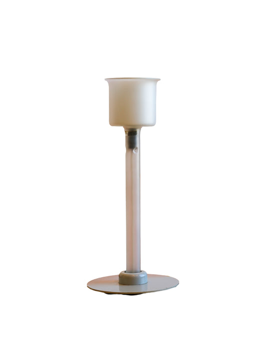 Postmodern Italian table lamp with frosted glass diffuser and tubular stem on a sculptural metal base by Fontana Arte 