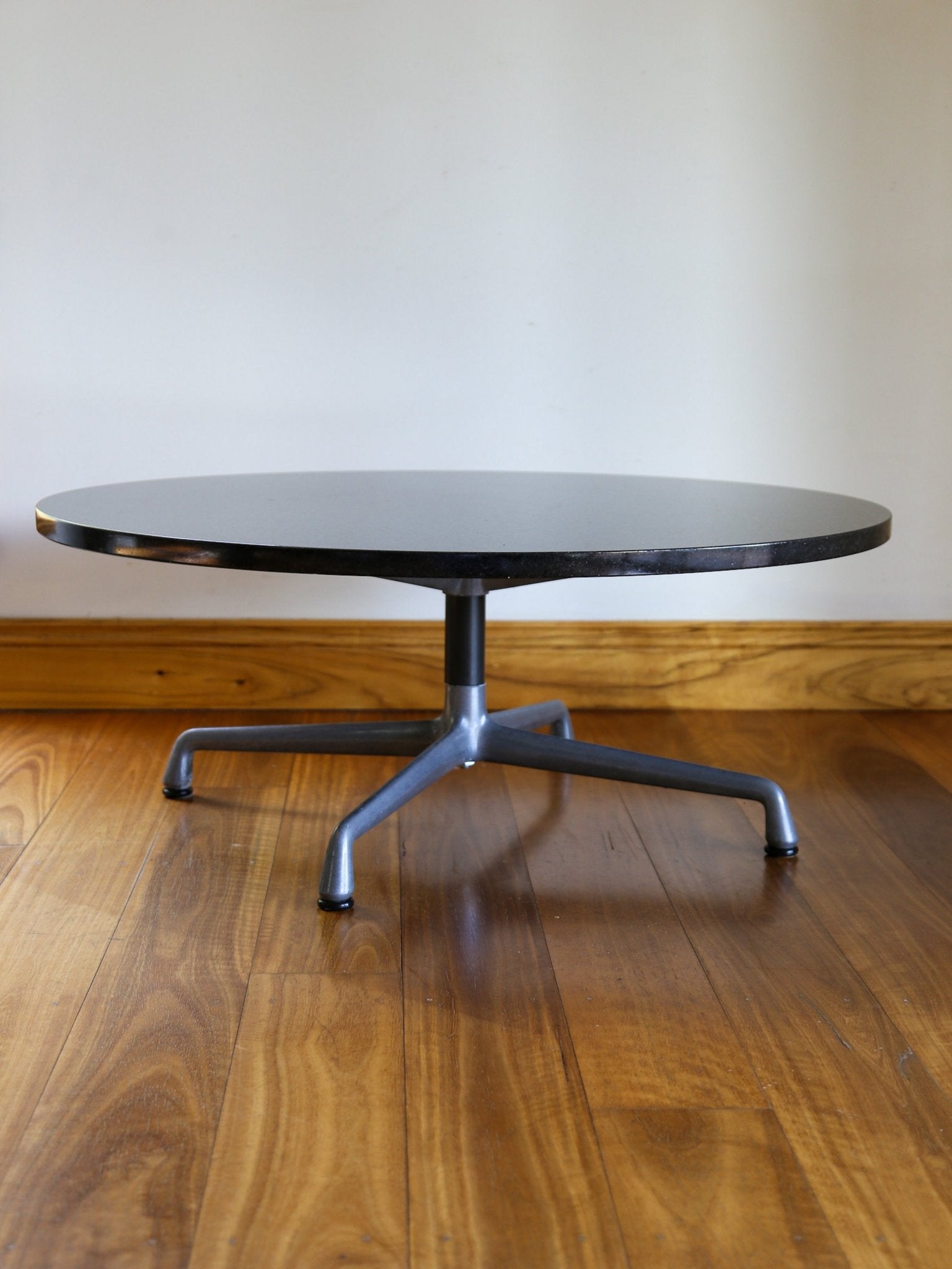 Herman Miller Eames Round Coffee Table in Black Granite and Aluminium Base - Lumini Collections