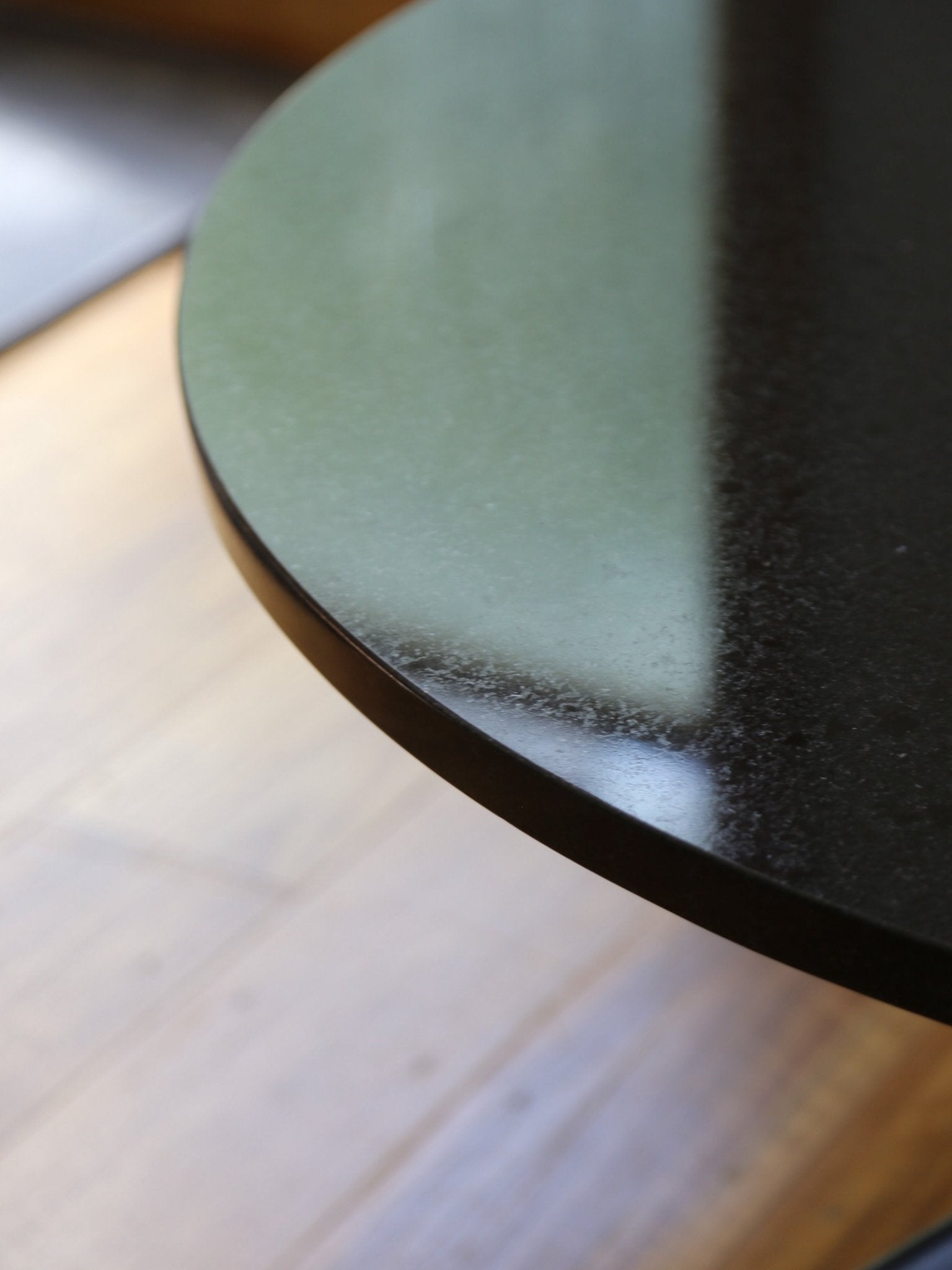 Herman Miller Eames Round Coffee Table in Black Granite and Aluminium Base - Lumini Collections