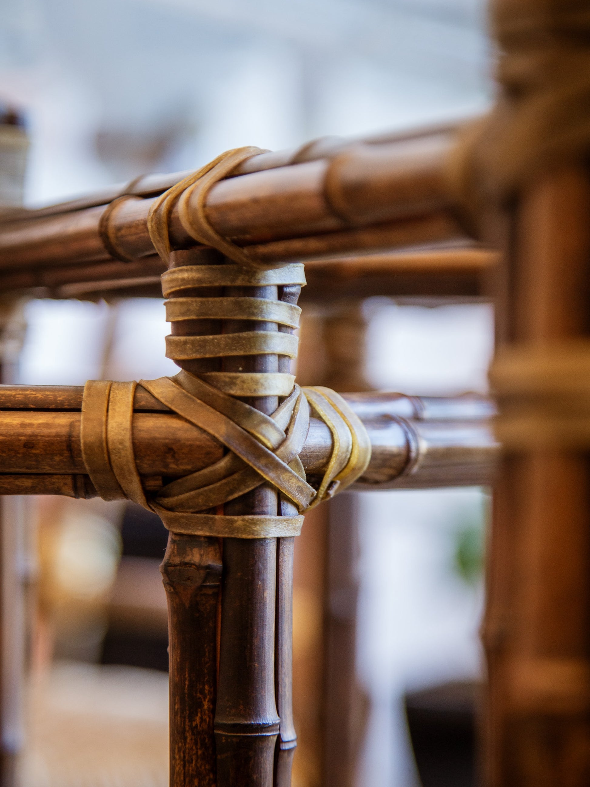Close-up of woven bamboo structure with blurred background