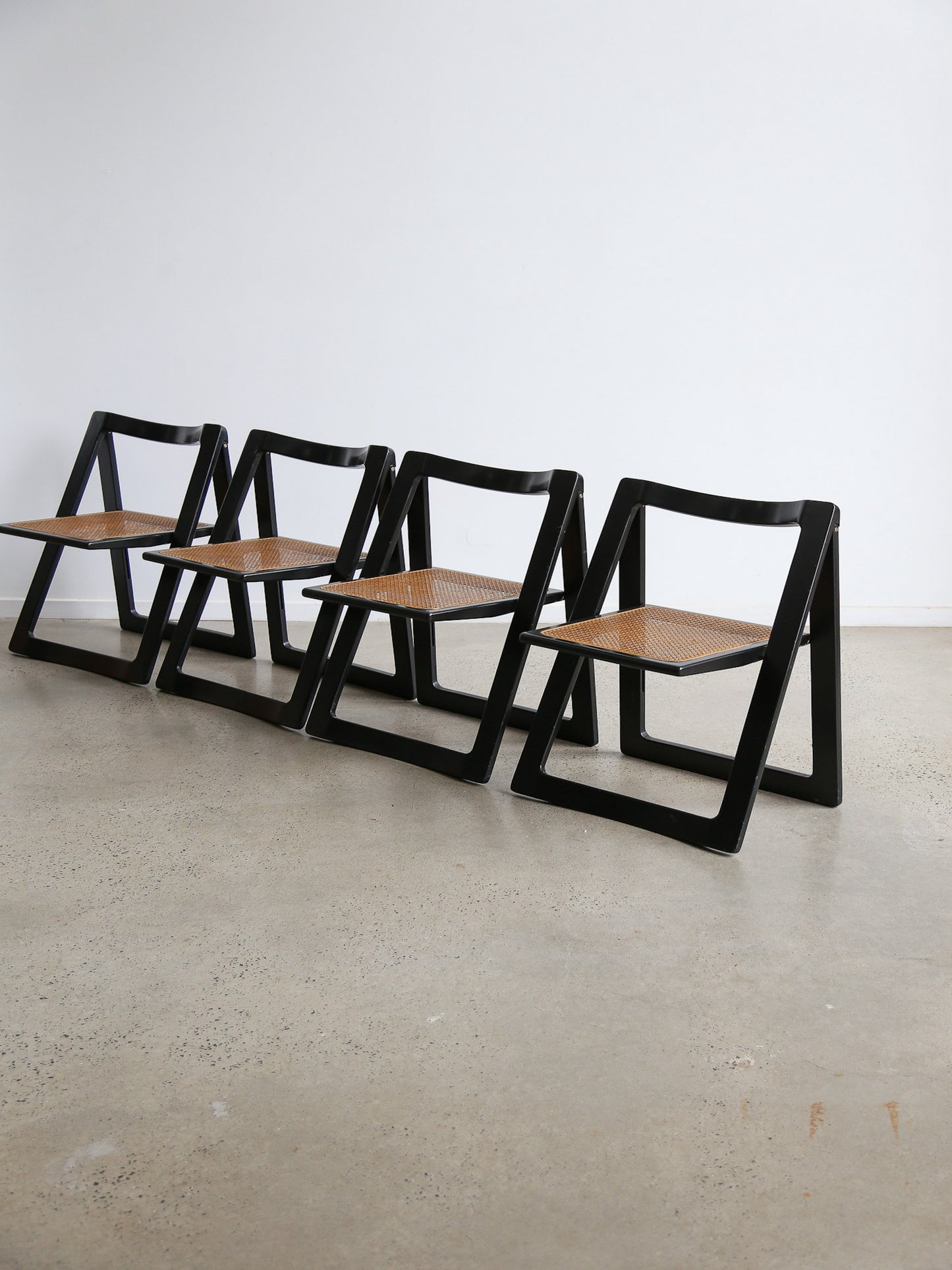 Trieste Set of Four Black Lacquered Folding Chairs by Jacob & D'aniello for Bazzani