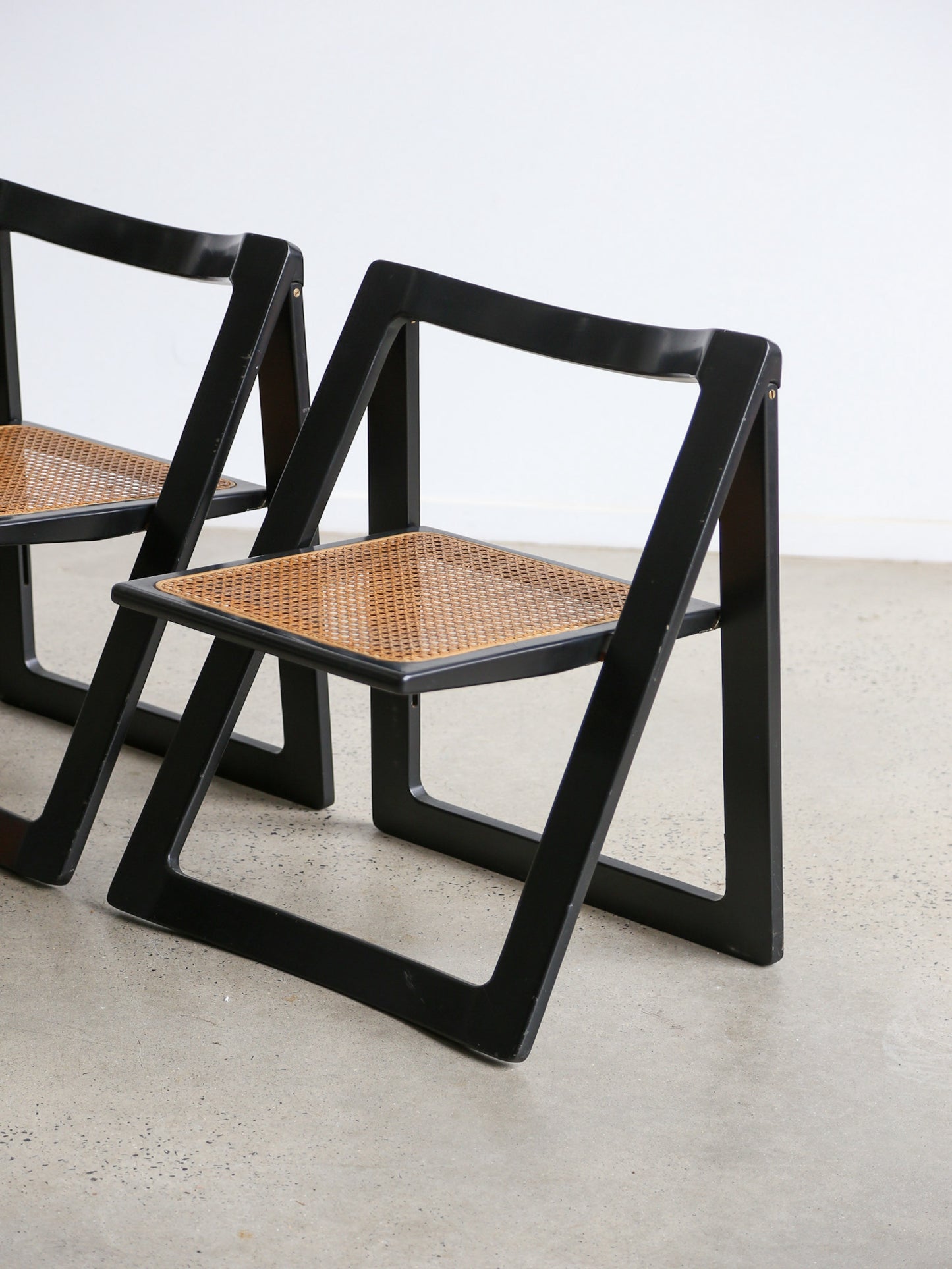 Trieste Set of Four Black Lacquered Folding Chairs by Jacob & D'aniello for Bazzani