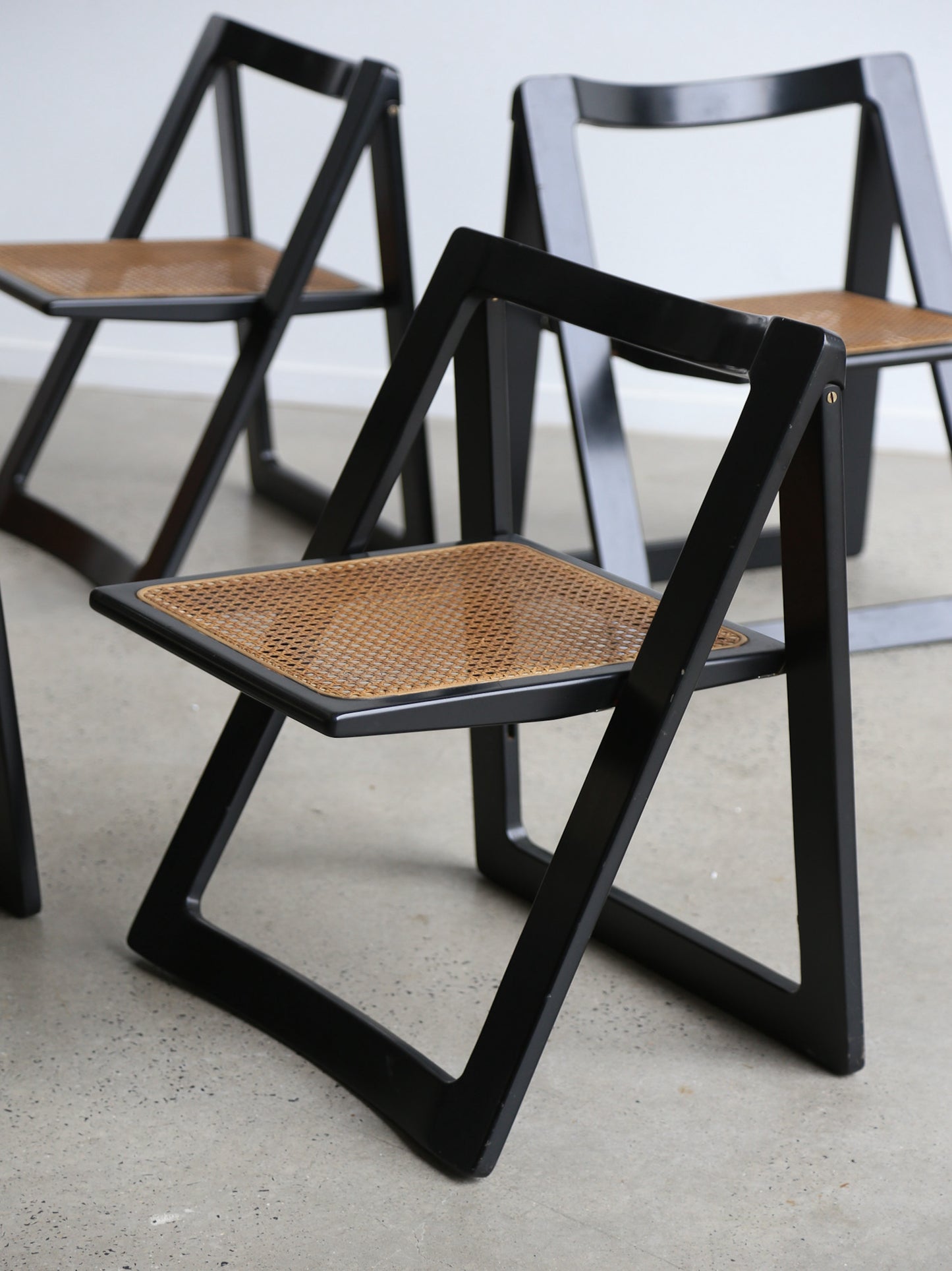 Trieste Set of Four Black Lacquered Folding Chairs by Jacob & D'aniello for Bazzani