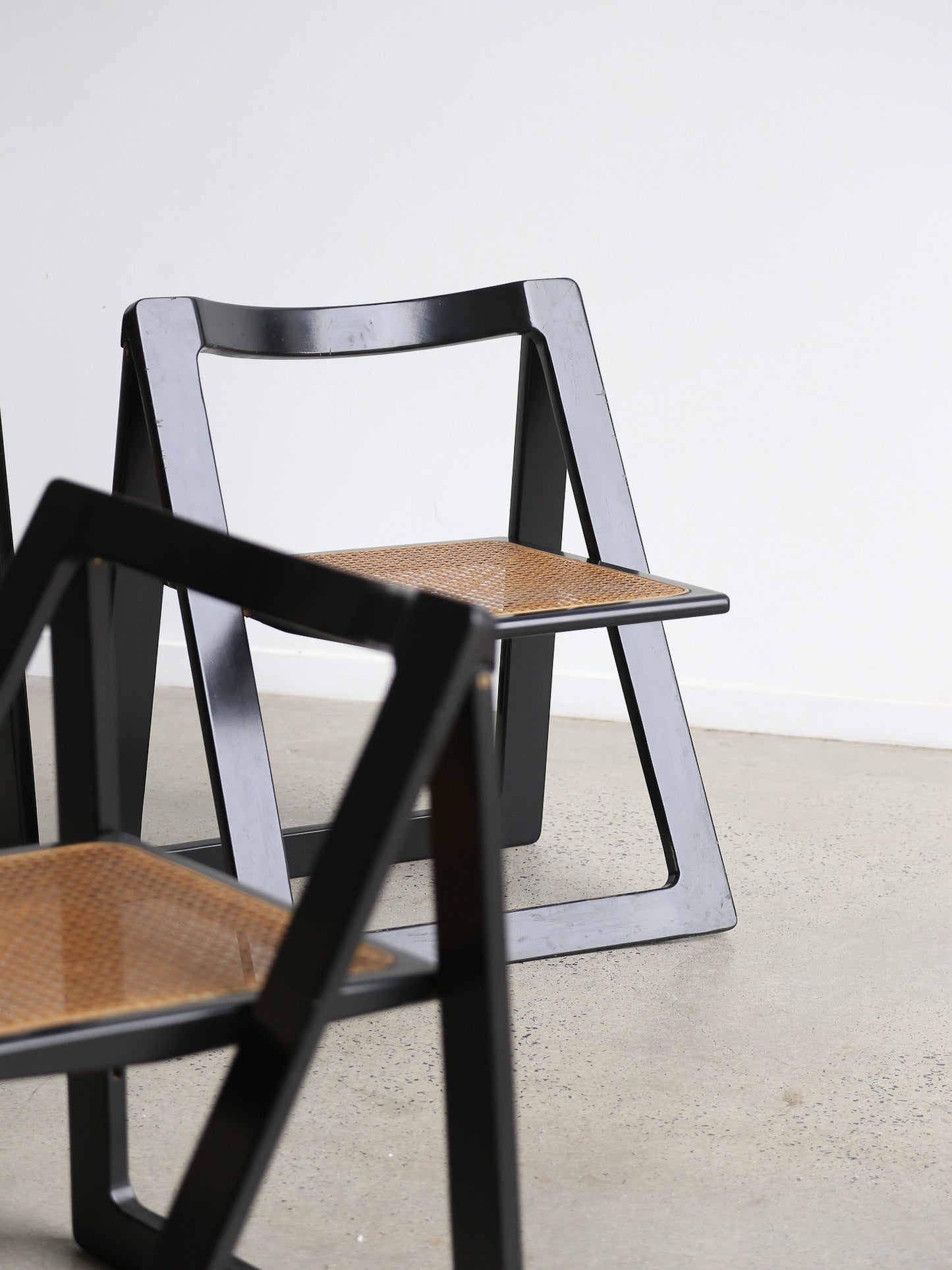 Trieste Set of Four Black Lacquered Folding Chairs by Jacob & D'aniello for Bazzani