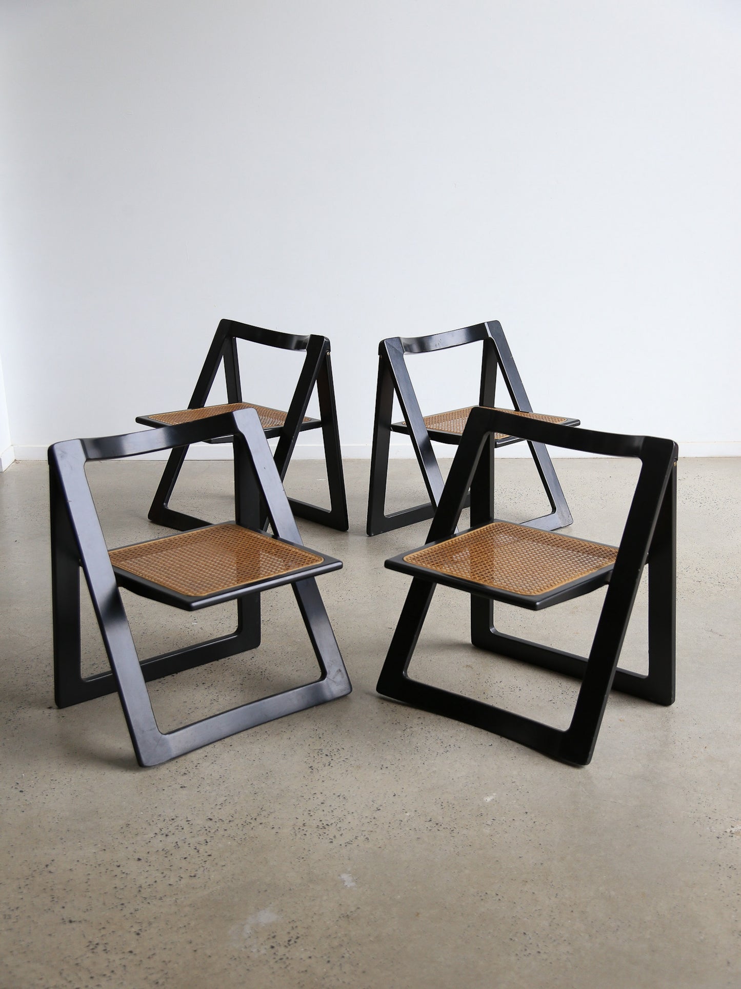 Trieste Set of Four Black Lacquered Folding Chairs by Jacob & D'aniello for Bazzani