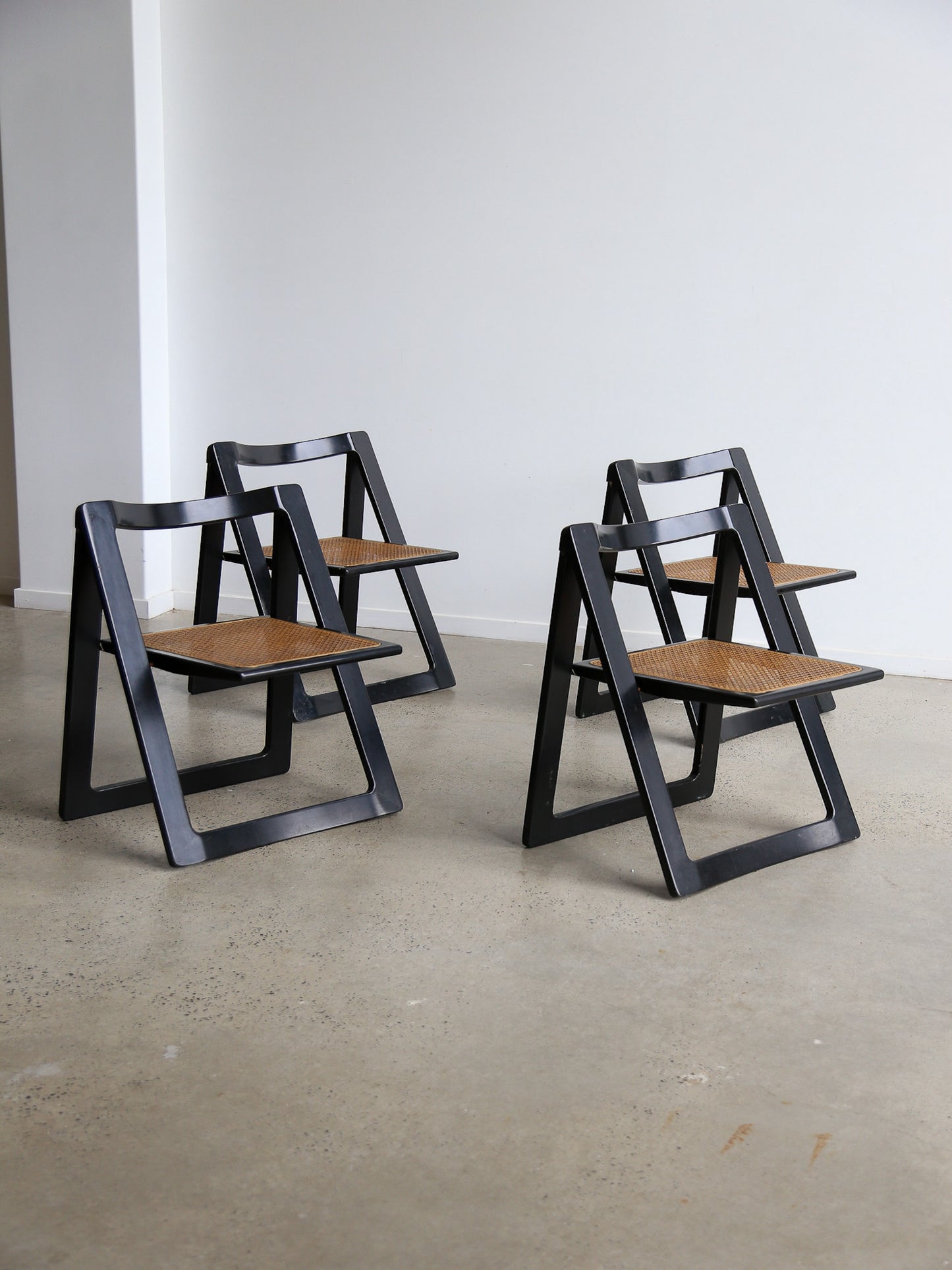 Trieste Set of Four Black Lacquered Folding Chairs by Jacob & D'aniello for Bazzani