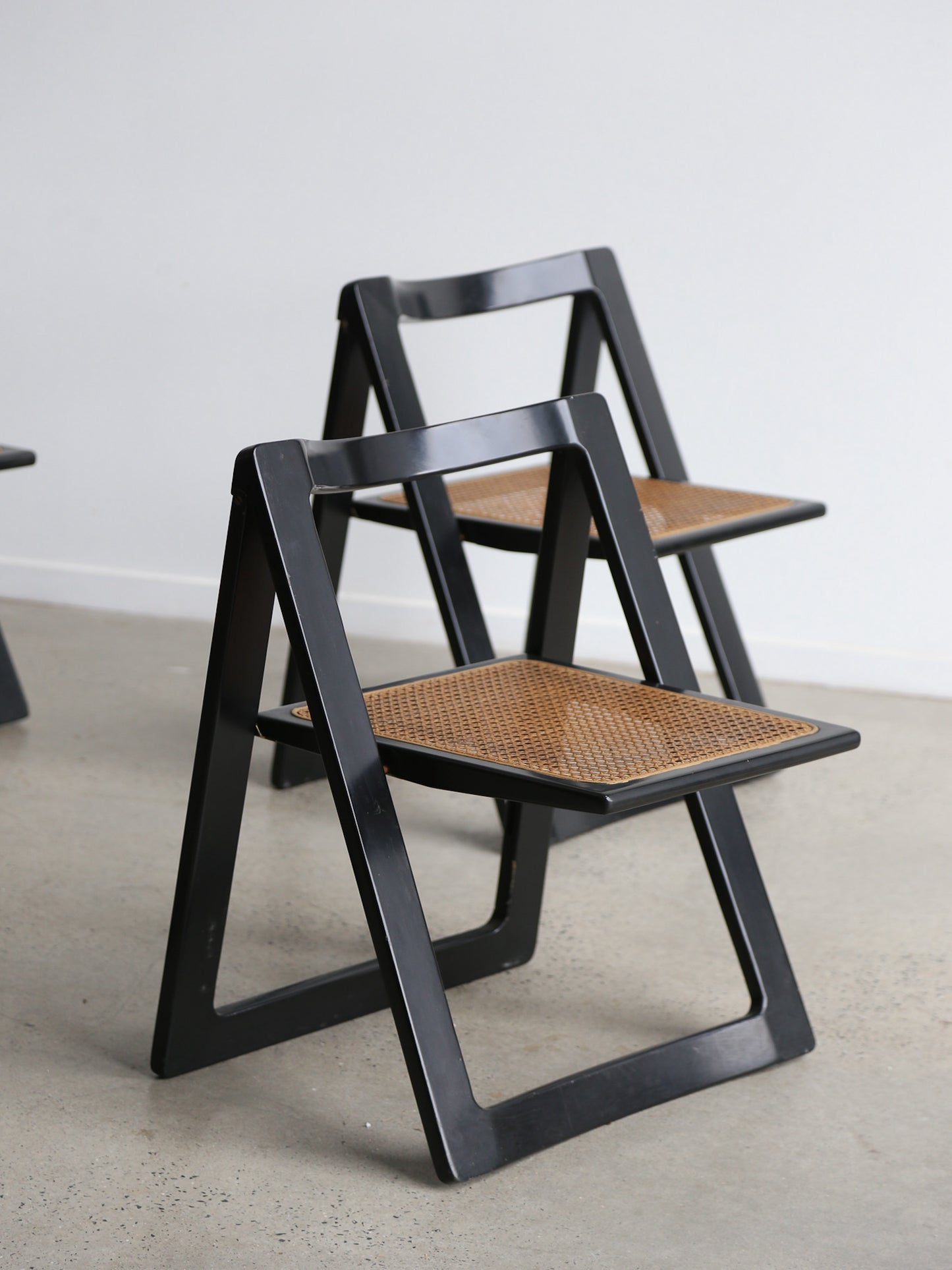 Trieste Set of Four Black Lacquered Folding Chairs by Jacob & D'aniello for Bazzani