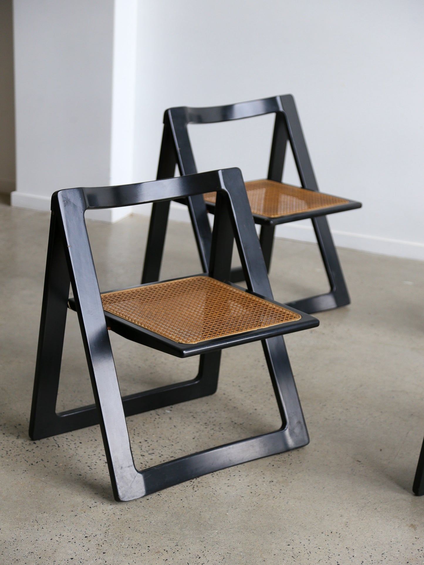 Trieste Set of Four Black Lacquered Folding Chairs by Jacob & D'aniello for Bazzani