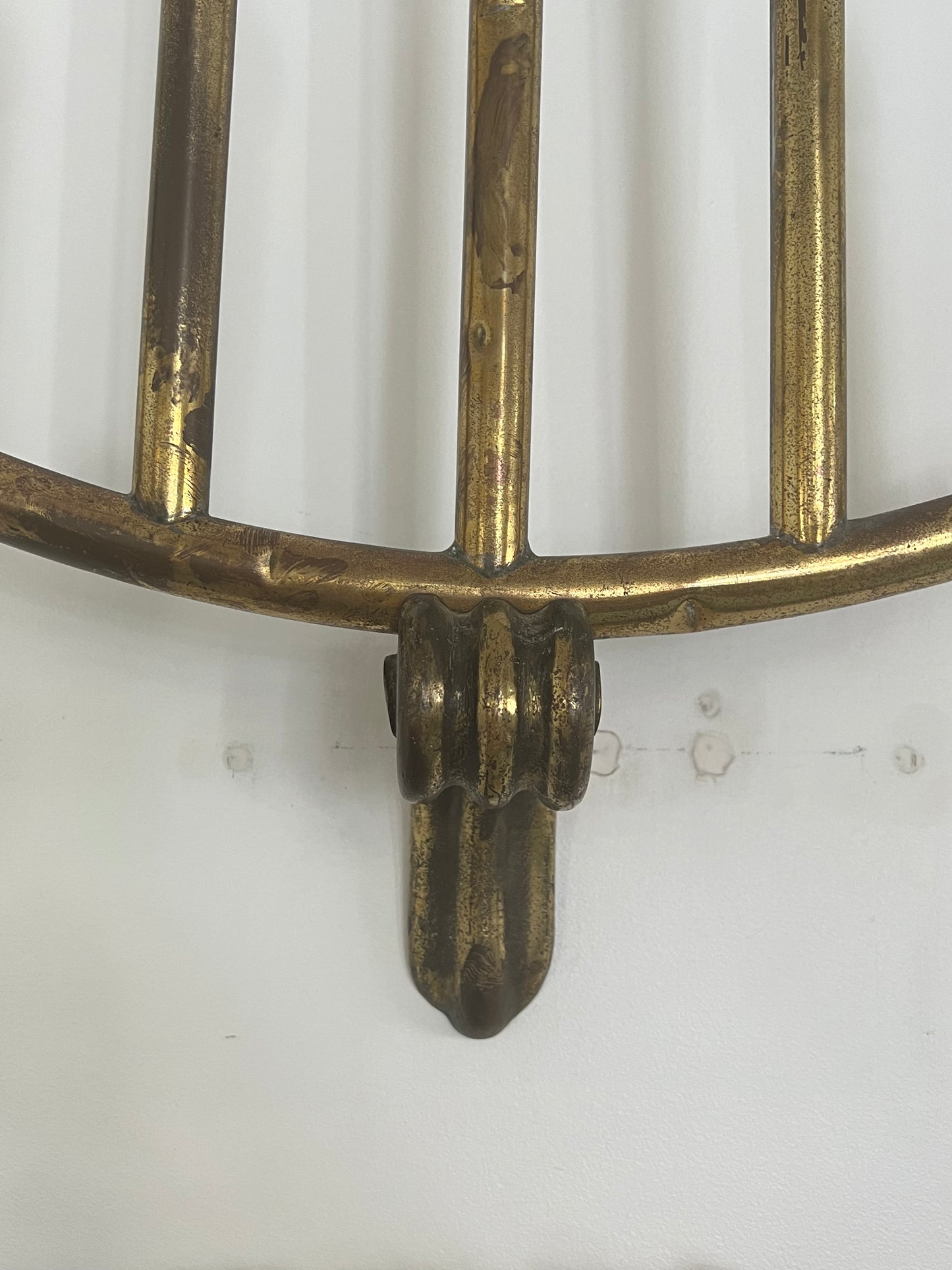 wall light with five bulbs over a white background