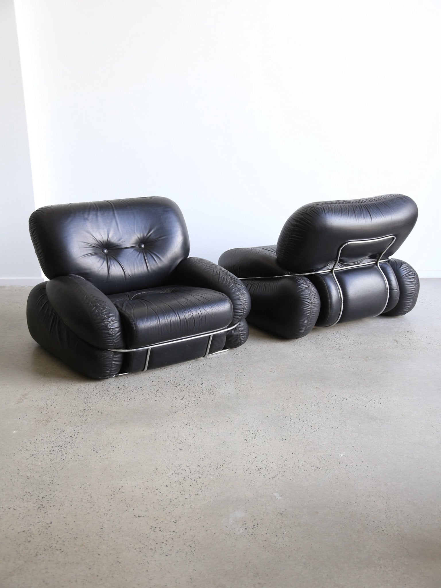 Italian Space Age “Okay” Armchairs by Adriano Piazzesi in Black Leather - Lumini Collections