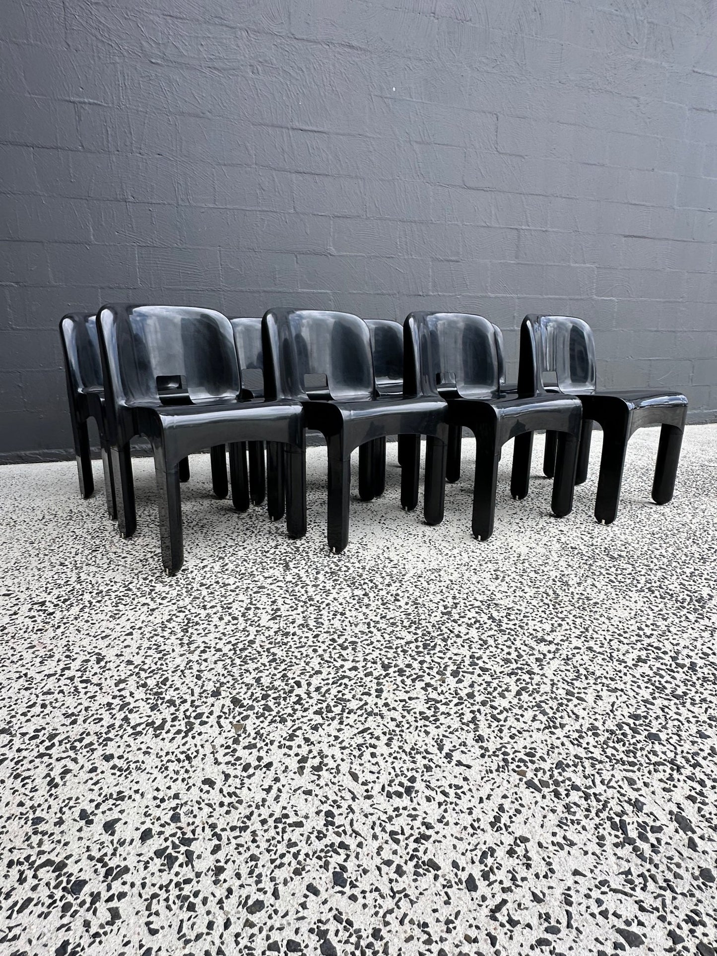 Joe Colombo for Kartell Universale Black Plastic Dining Chairs Set of Eight - Lumini Collections