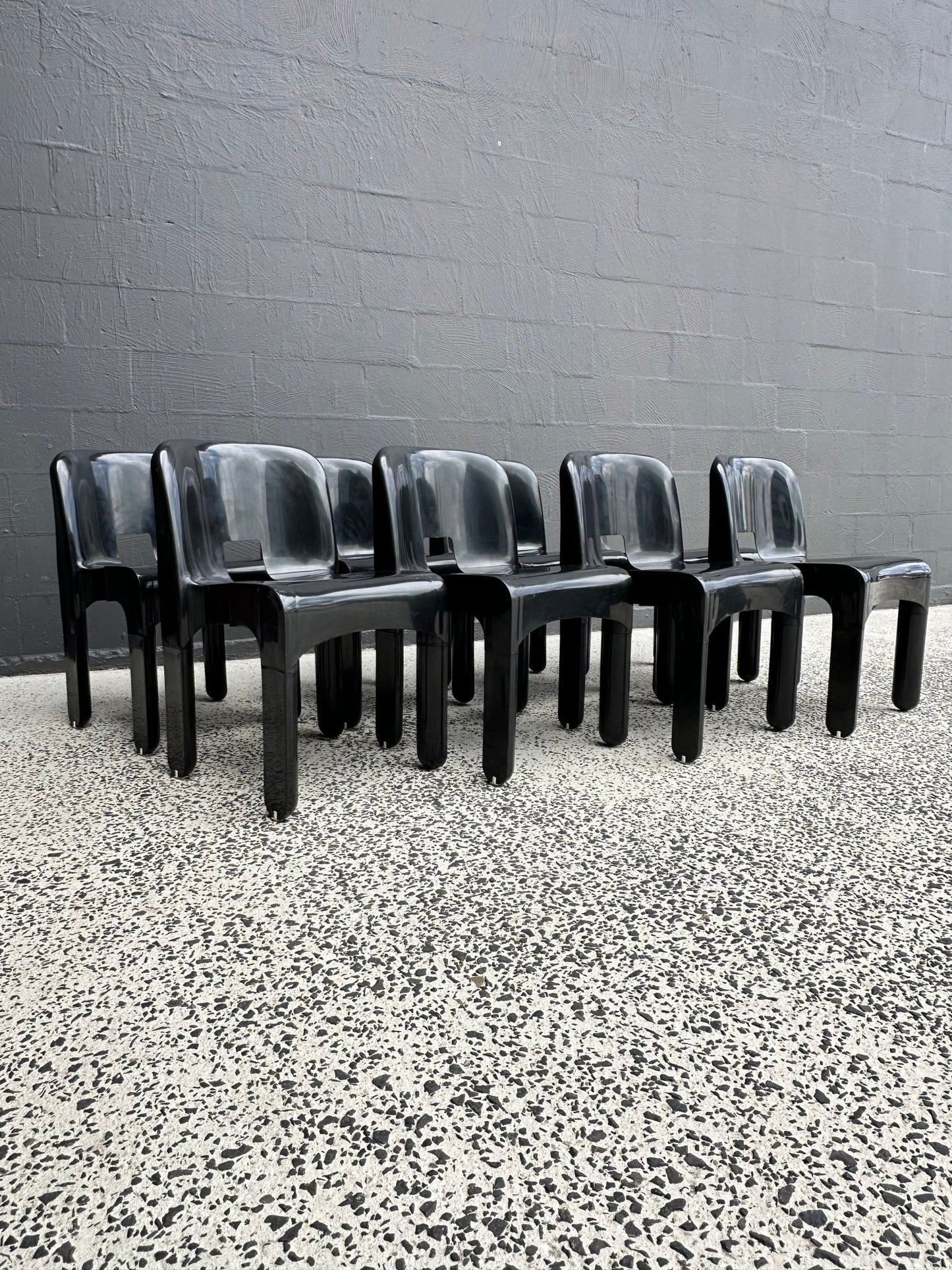 Joe Colombo for Kartell Universale Black Plastic Dining Chairs Set of Eight - Lumini Collections
