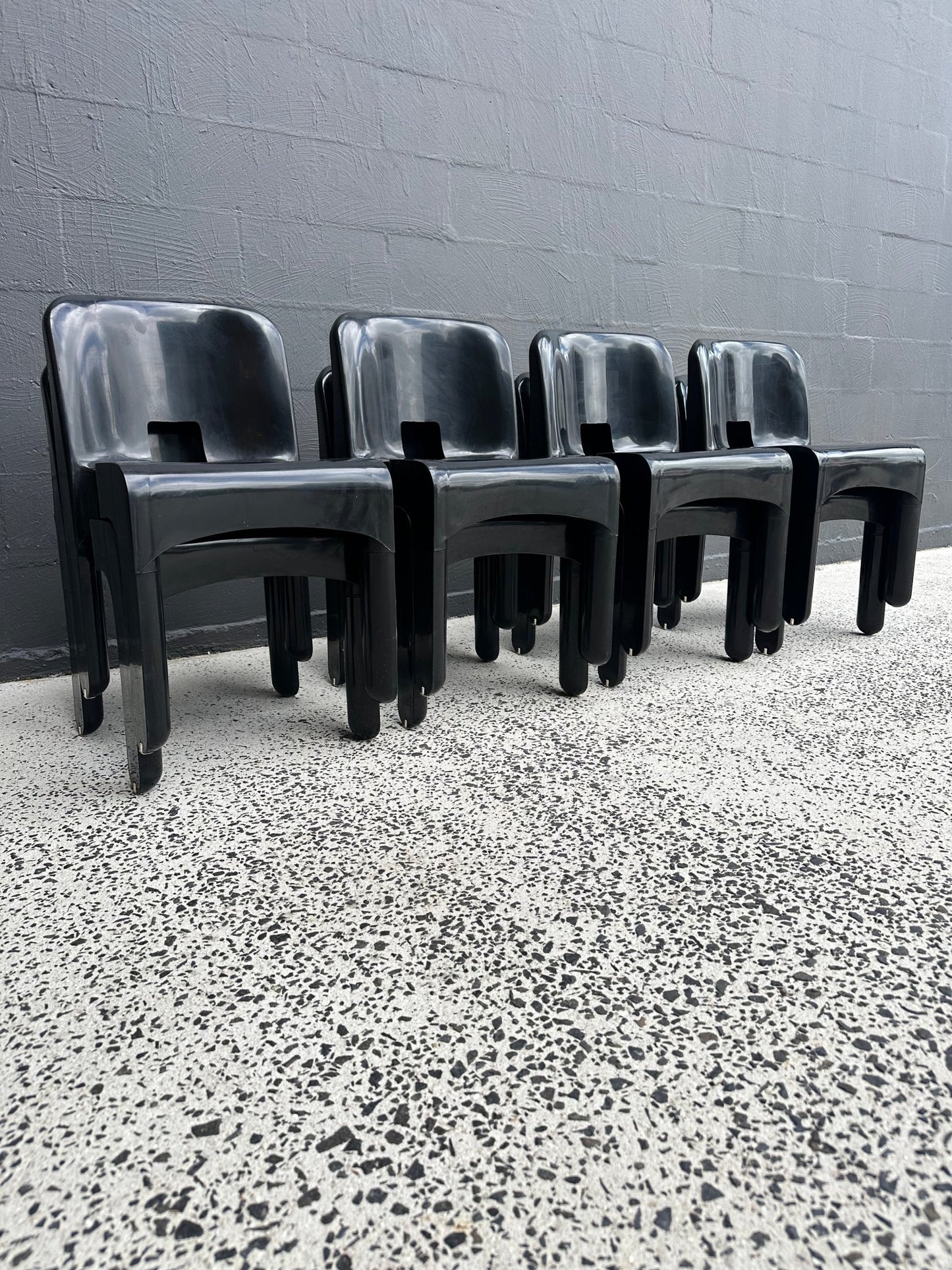 Joe Colombo for Kartell Universale Black Plastic Dining Chairs Set of Eight - Lumini Collections