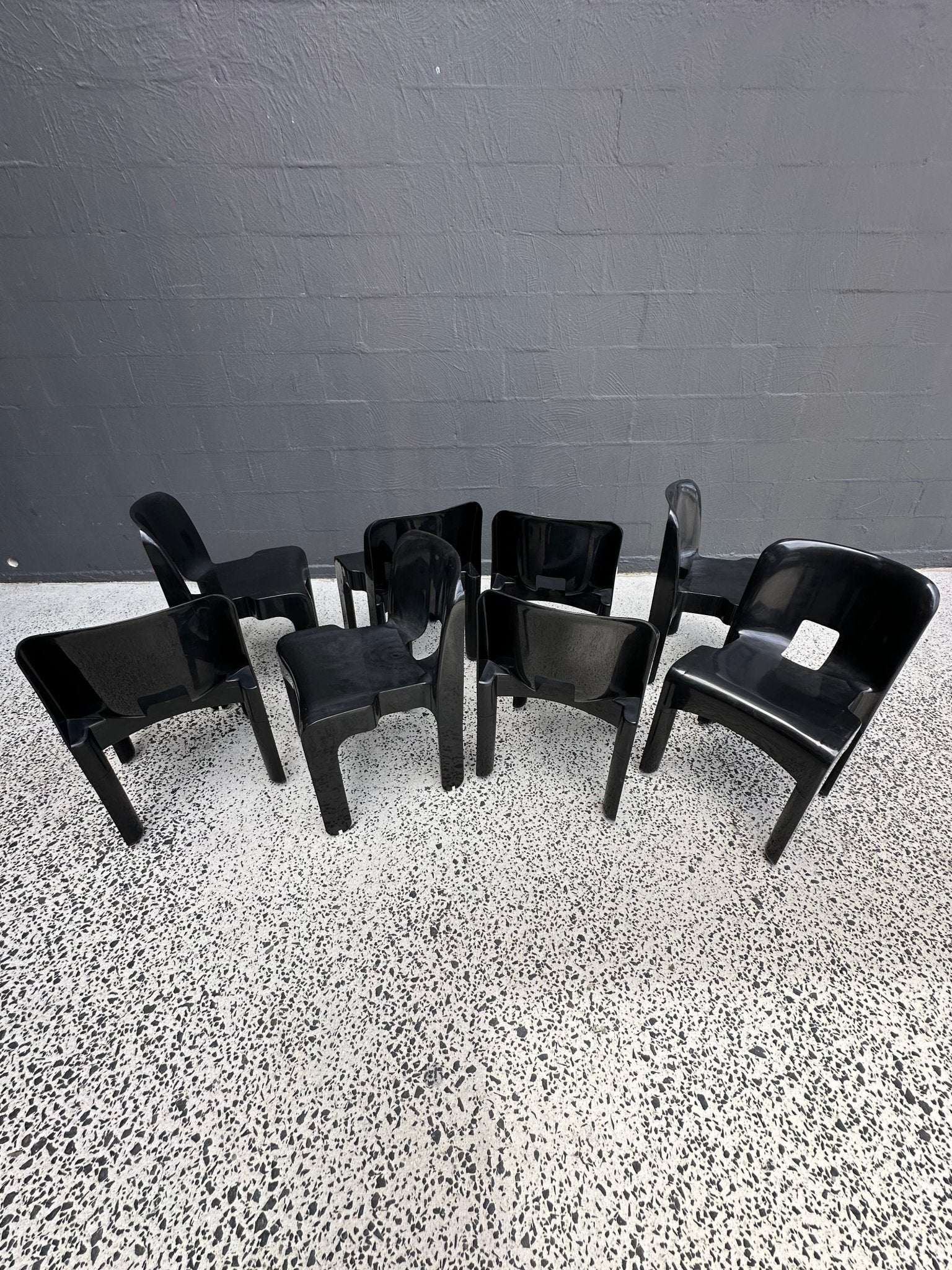 Joe Colombo for Kartell Universale Black Plastic Dining Chairs Set of Eight - Lumini Collections