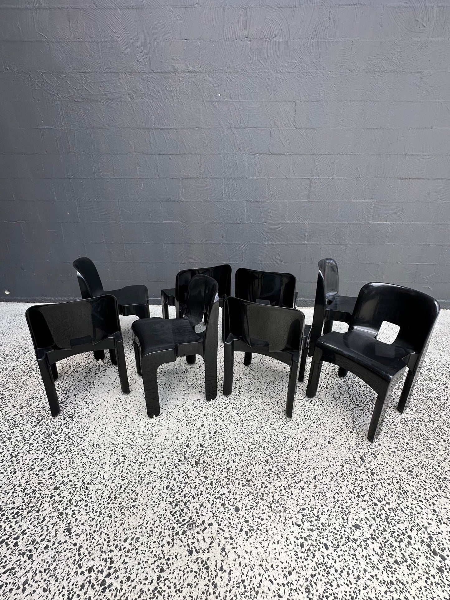 Joe Colombo for Kartell Universale Black Plastic Dining Chairs Set of Eight - Lumini Collections