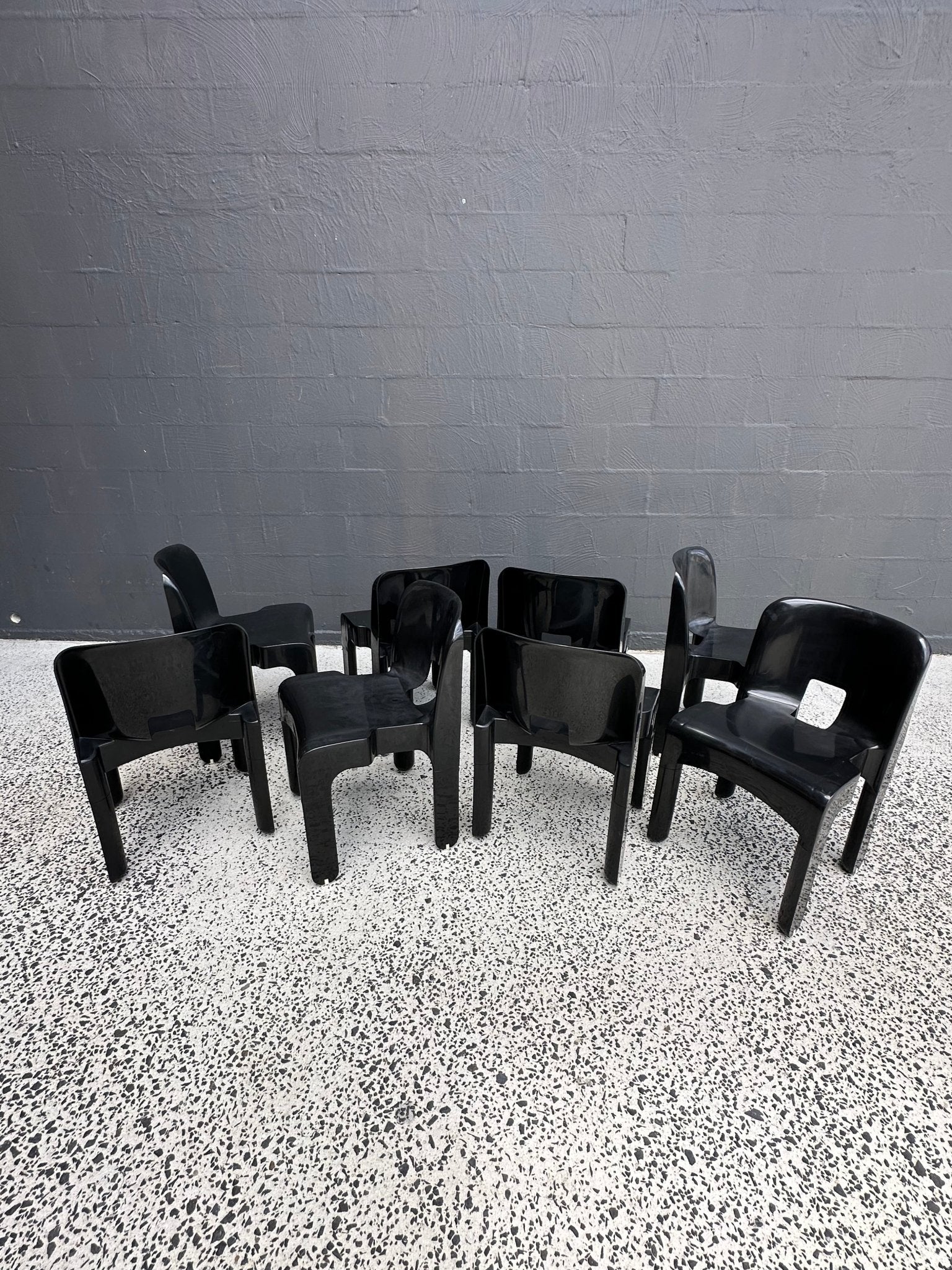 Joe Colombo for Kartell Universale Black Plastic Dining Chairs Set of Eight - Lumini Collections