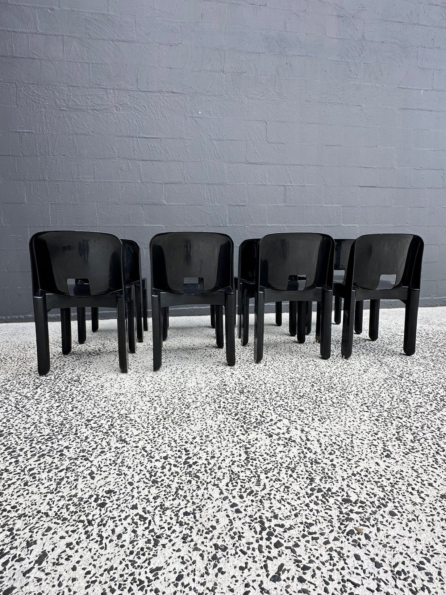Joe Colombo for Kartell Universale Black Plastic Dining Chairs Set of Eight - Lumini Collections