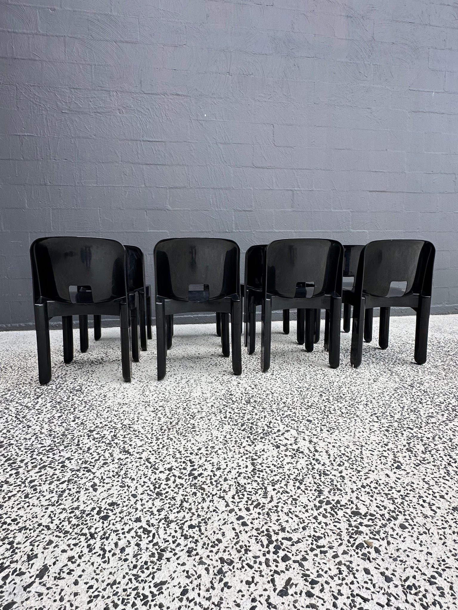 Joe Colombo for Kartell Universale Black Plastic Dining Chairs Set of Eight - Lumini Collections