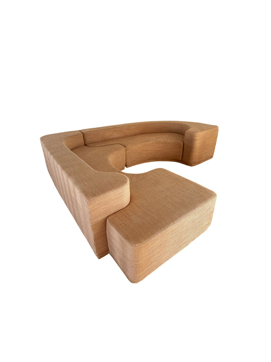 Lara sofa, sculptural Italian modular sofa with interlocking sections in textured upholstery, designed by Pamio, Massari & Toso for Stilwood in Woven fabric upholstery, foam, wood frame